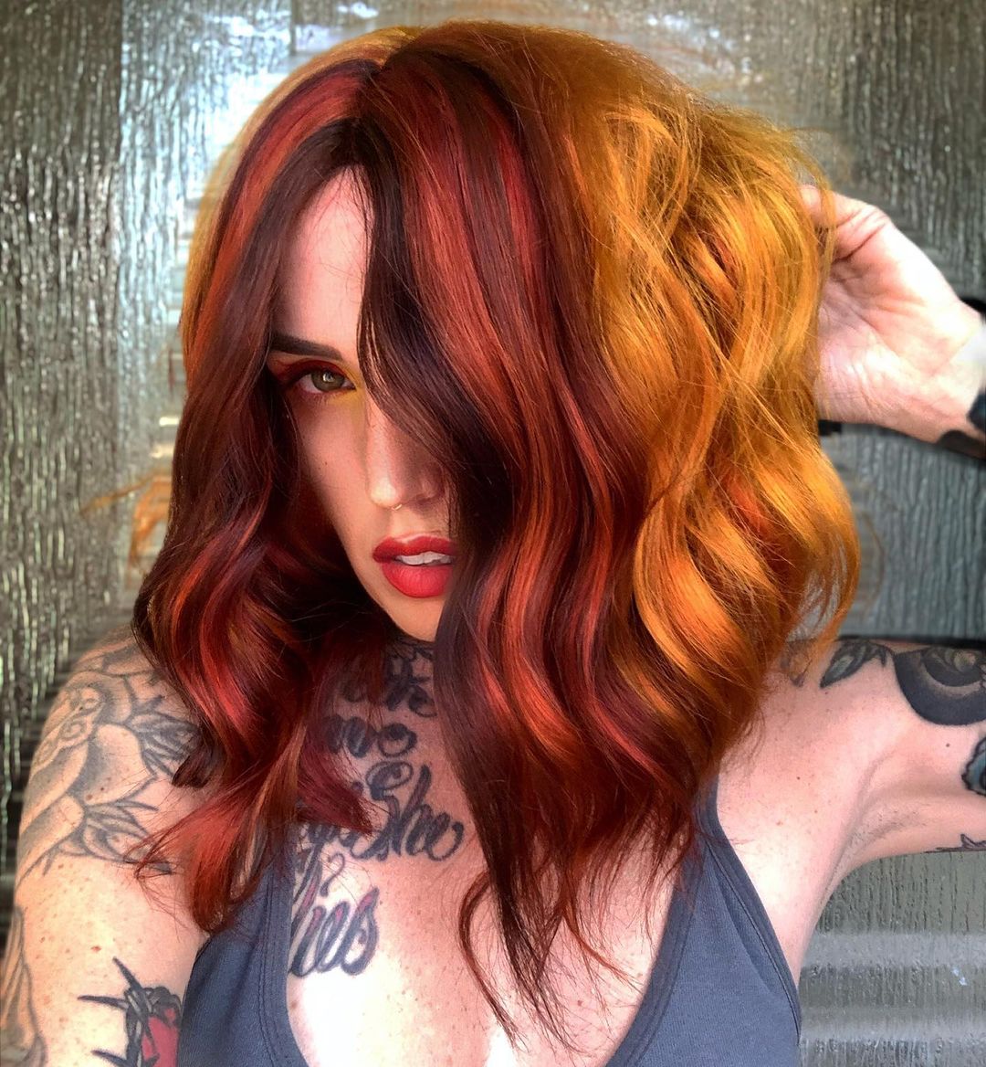 27. Fiery Elegance: A Blend of Bold Reds and Auburn Hues