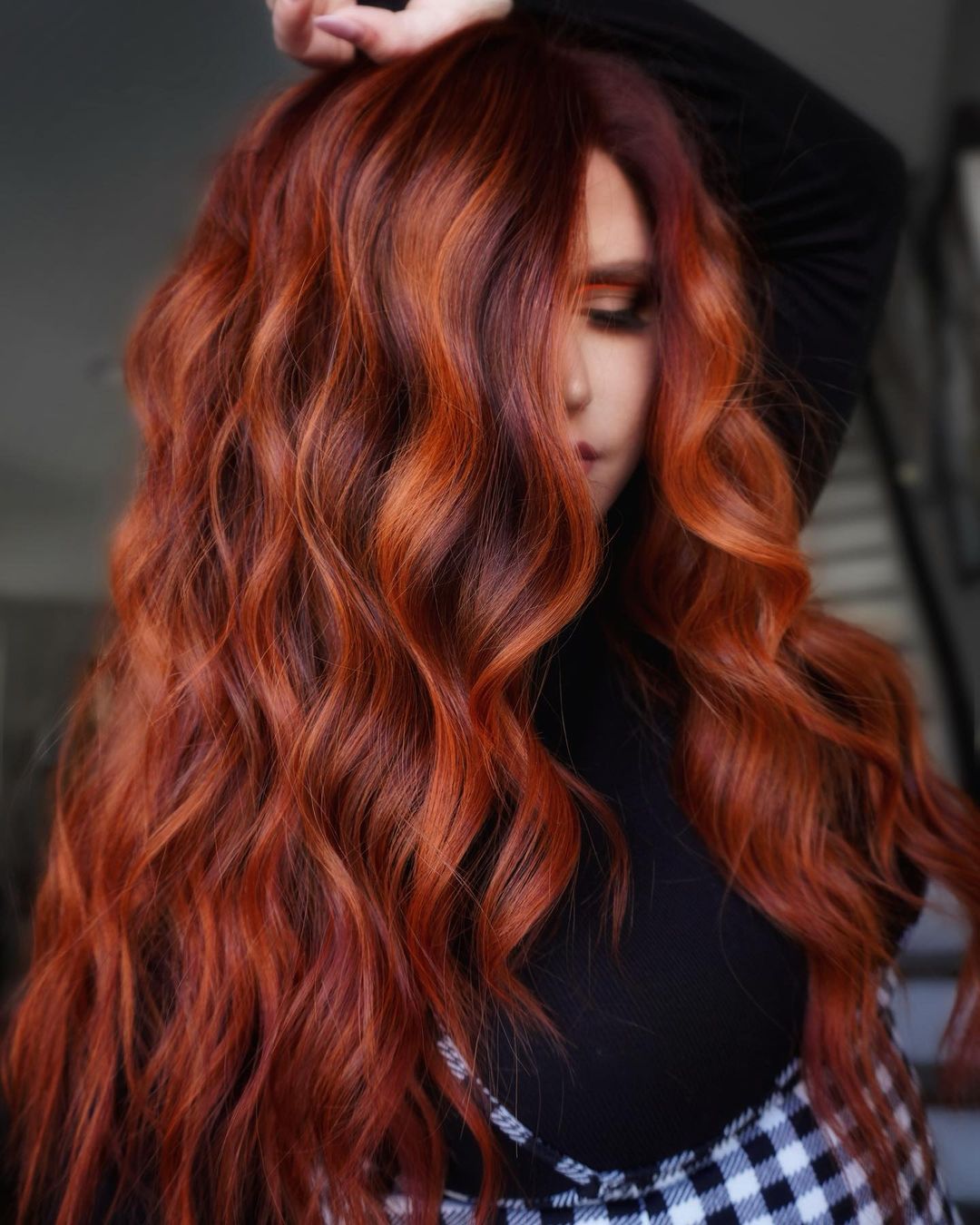 6. Fiery Elegance: Cascading Waves of Ginger Hair