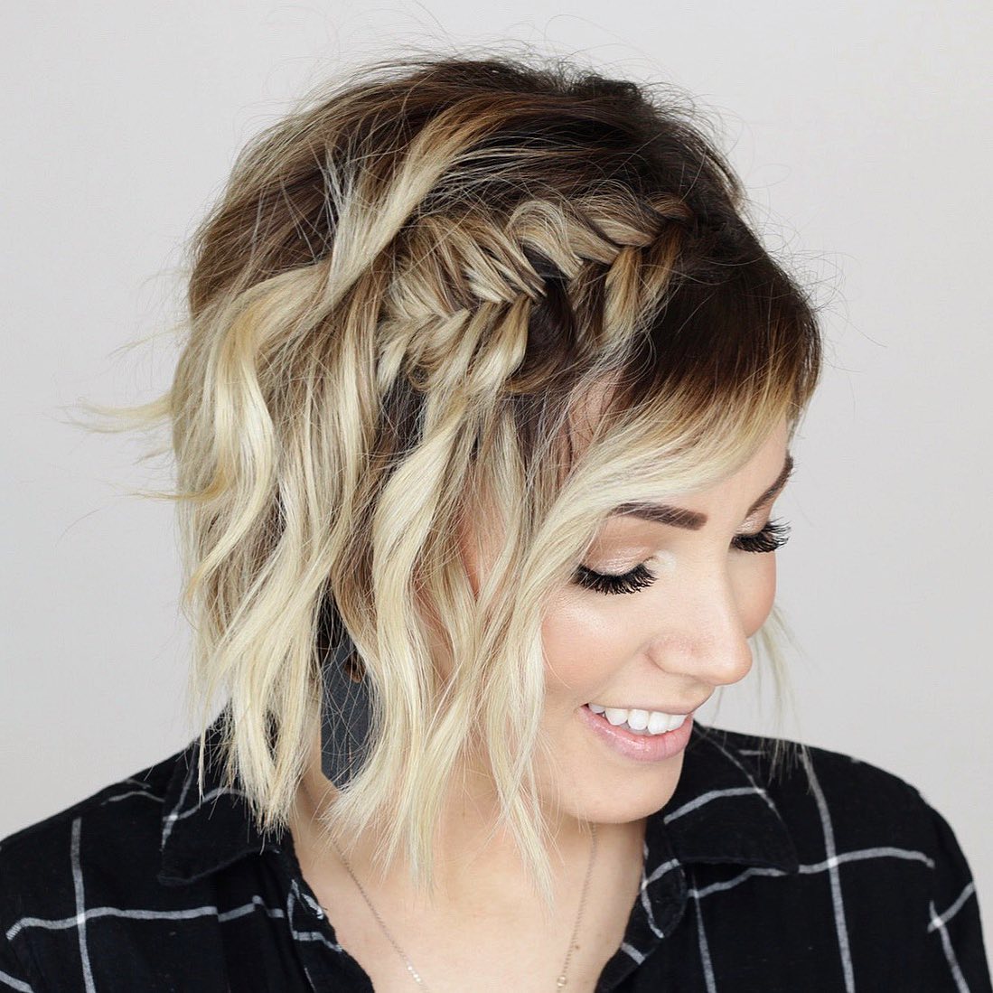 2. Effortless Side Braid with Tousled Waves
