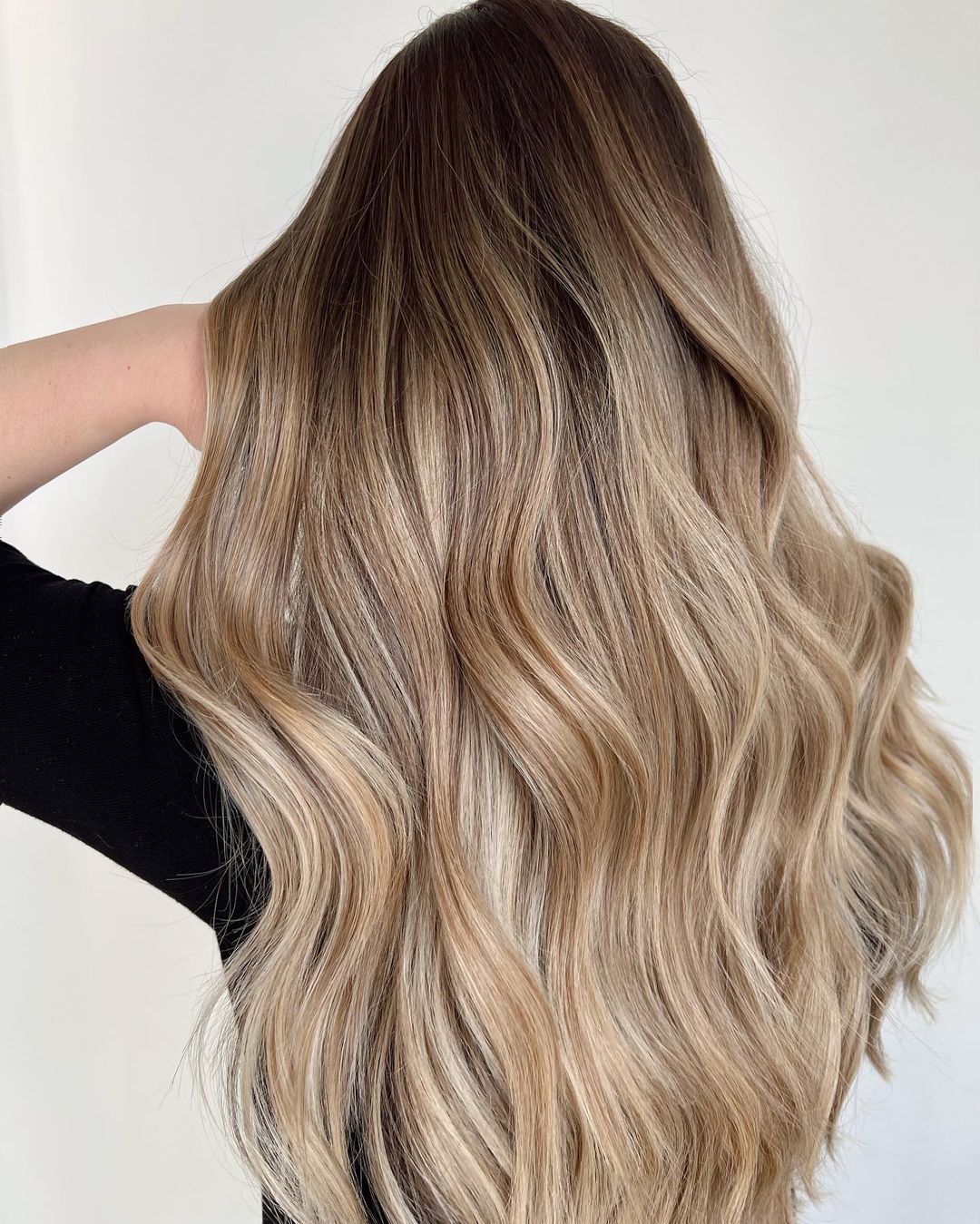 Dramatic Dark Blonde Balayage with Root Melt
