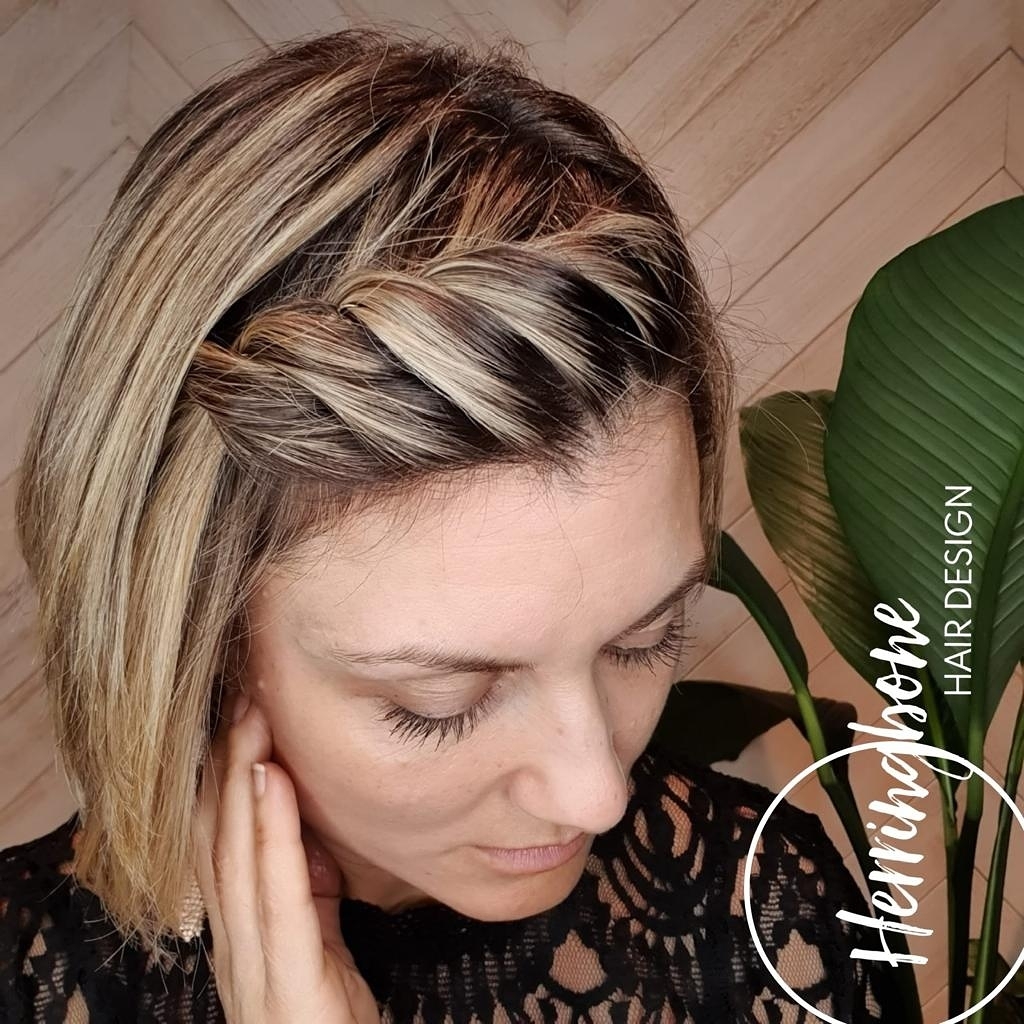 29. Chic Twisted Crown Braid for Effortless Elegance