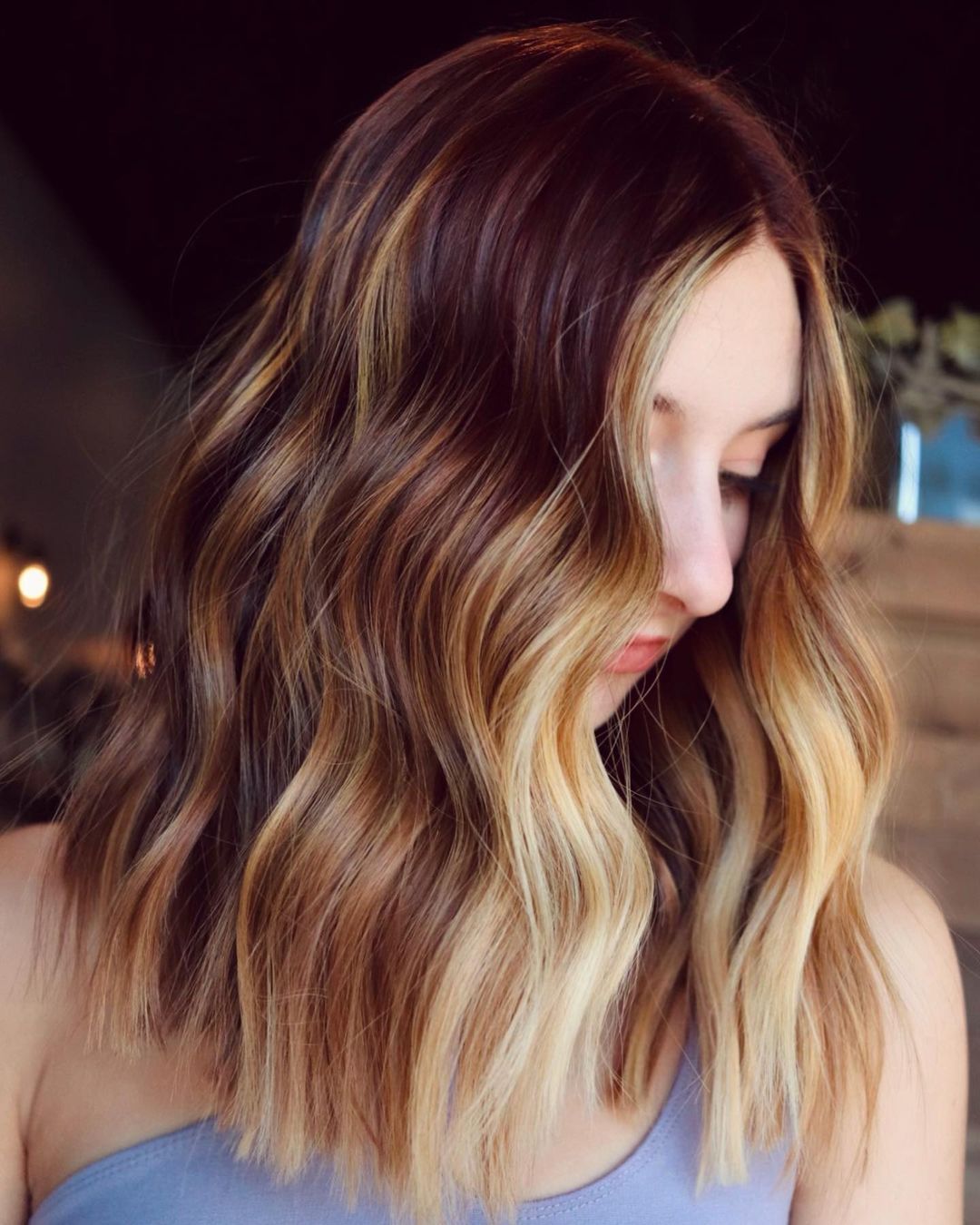 36. Radiant Blend: Warm Ginger Waves with a Luminous Glow
