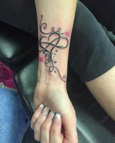 14 Wrist Wrap Tattoos for Women Ideas: Delicate and Stylish Ink