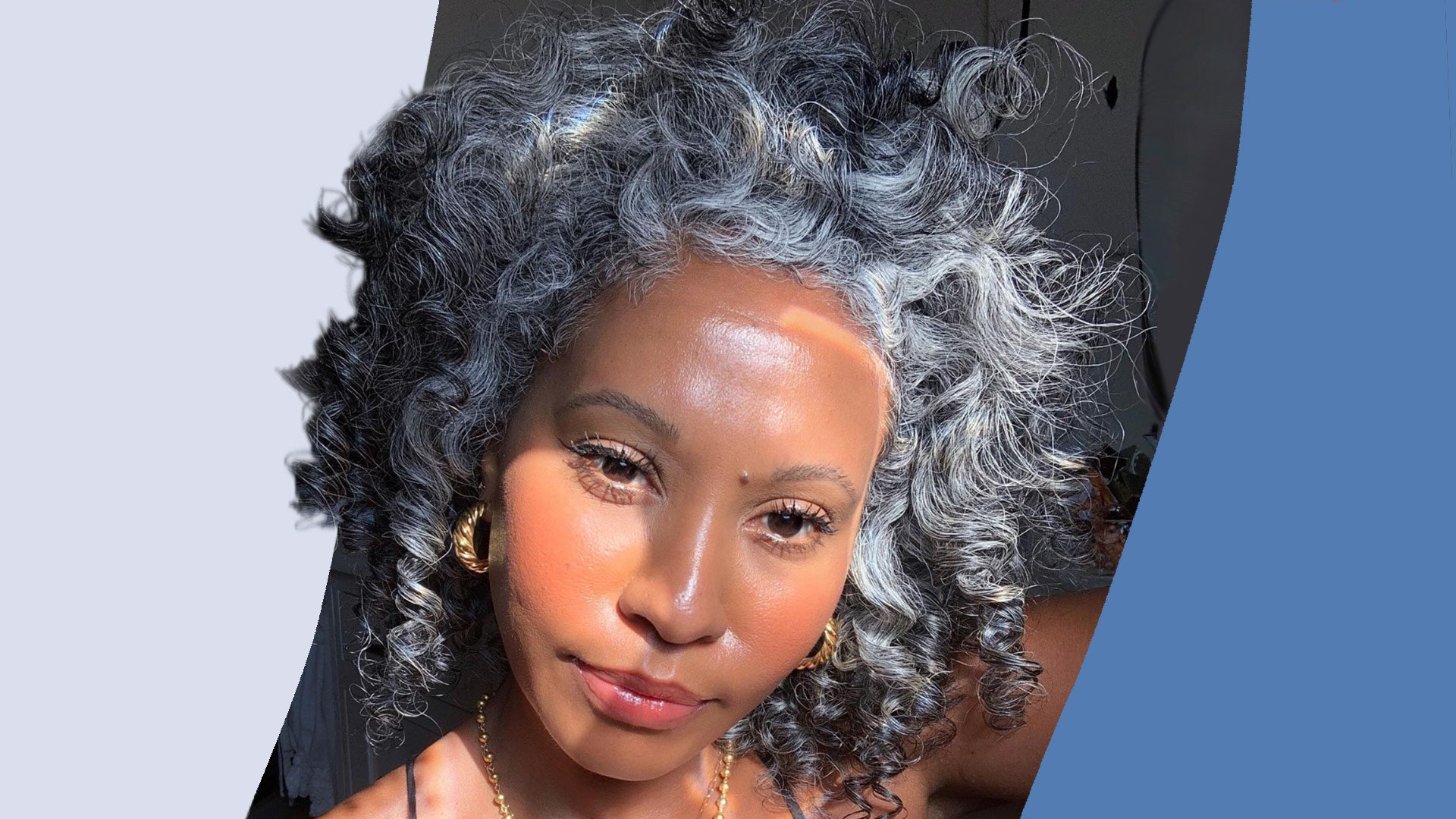 27. Embracing Natural Elegance with Curly Grey Highlights