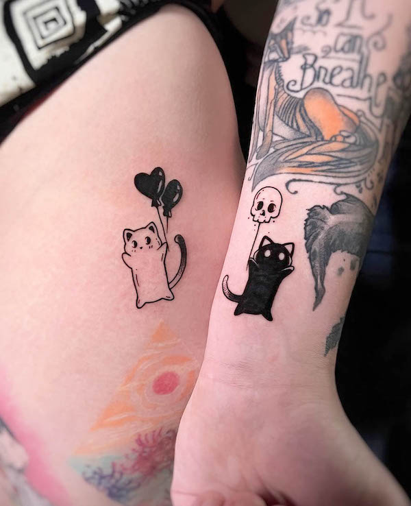 60. "Playful Cats with a Touch of Romance and Mystery"