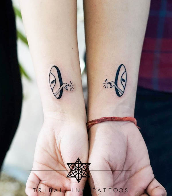 63. The Magic of Connection: Yin and Yang-Inspired Couple Tattoos