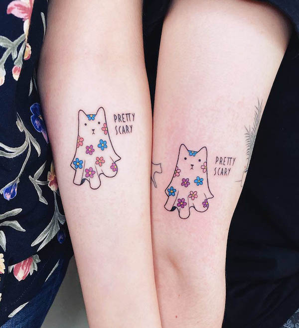 37. Whimsical Ghost Cats with a "Pretty Scary" Charm