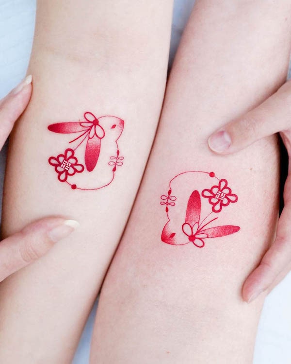 48. Whimsical Harmony: Dual Bunny Tattoos That Speak of Love