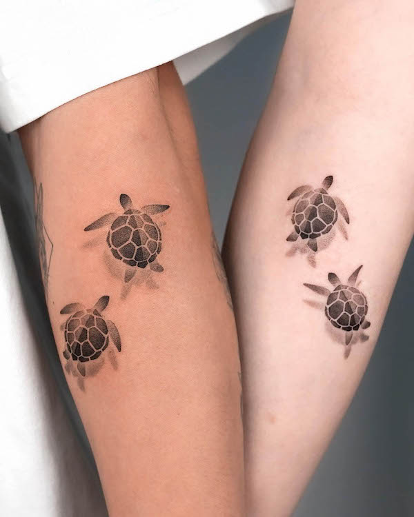 49. Timeless Harmony in Matching Turtle Tattoos