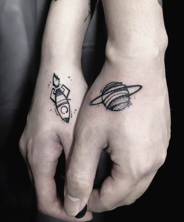 47. A Cosmic Connection: Rocket and Planet Couple Tattoos