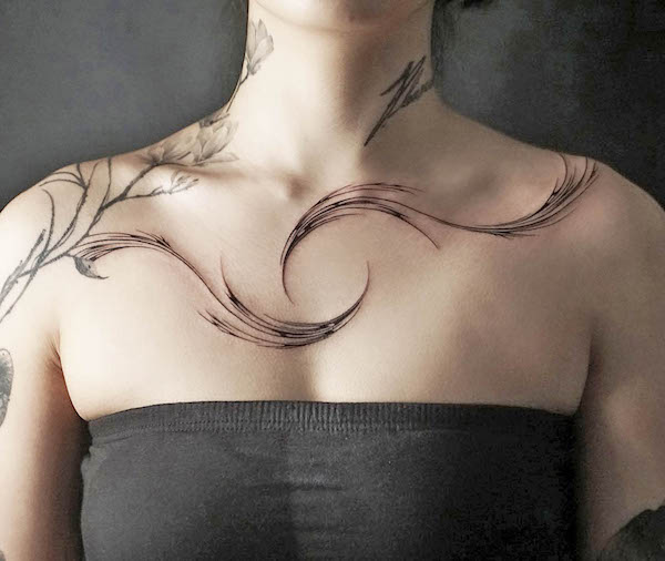 57 Gorgeous Collarbone Tattoos For Women Whimsical swirl collarbone tattoo for women by @tattooist.pado_