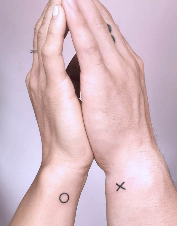 22. Timeless Simplicity: XO Tattoos That Speak Volumes